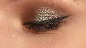 eye makeup woman applying eyeshadow