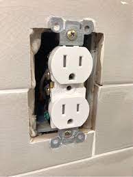 Wall outlet plate smartphone dock. Why Are My Wall Plates Bowing Outward Home Improvement Stack Exchange