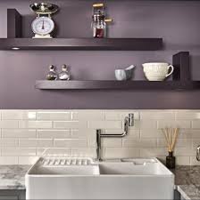 So bright and cheery you almost expect birds to fly in and sing a tune. 4 Rich Jewel Tones For A Gem Of A Kitchen Purple Kitchen Walls Kitchen Cabinets Grey And White Contemporary Style Kitchen