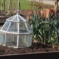 While garden soil is used for outdoor planting beds, container gardening plants require potting soil. What The Heck Is A Cloche Does My Garden Need One Organic Authority