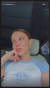Millie bobby brown is 'taking action' against an influencer tiktok videos reveal the darker side of y2k fashion tiktok's photo animation filter has its eye on you We Found Millie Bobby Brown S Cozy Summer Sweatshirt Teen Vogue