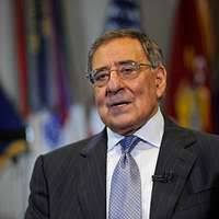 U.S. Navy Rear Adm. Mark Montgomery, left, the commander,