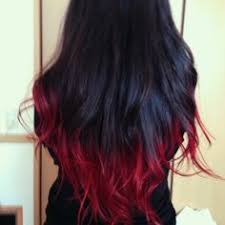 The curled long bob matches the stylish shade for a modern look. 20 Black Hair Red Highlights Ideas Hair Long Hair Styles Hair Styles