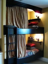 This functional setup is built directly into the wall, allowing for a double desk and a. Guest Bunks Making The Best Use Of Small Spaces The Inspired Room Kids Bunk Beds Shared Girls Bedroom Small Room Bedroom