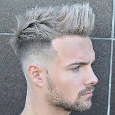 A short and spiky mohawk hairstyle with a medium fade at the sides. 55 Edgy Or Sleek Mohawk Hairstyles For Men Men Hairstyles World