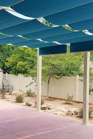 Turquoise Blue Fabric Shades On White Backyard Pergola Pergola Patio Shade Backyard Pergola