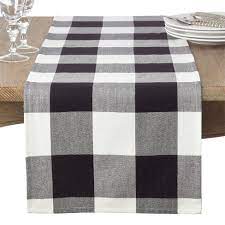 It is also great for entryway tables, low bookshelves, dining tables, or other surfaces of your home to add a rustic look. Plaid Table Runner Black Saro Lifestyle Target
