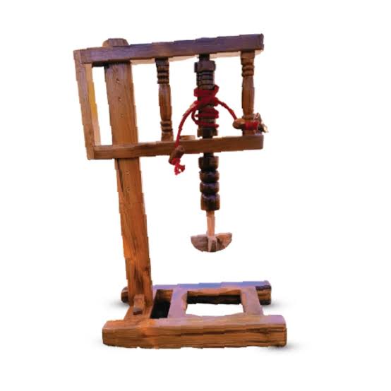 The ancient wooden Bilona churner has been used for millennia to churn cultured dahi into butter, AI generated