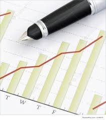 business chart sales growth charts close up pen on positive earning graph