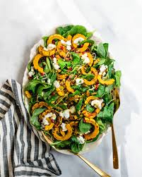 Delicata Squash Salad With Pomegranate A Couple Cooks Recipe Squash Salad Delicata Squash Vegetarian Cookbook