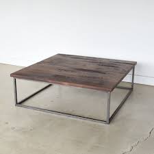 Featuring an intricate, inlaid wood surface, this coffee table seamlessly blends simplistic construction and ornate style. Box Frame Reclaimed Wood Coffee Table What We Make