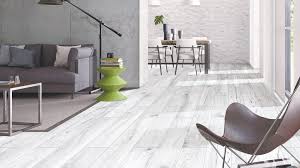 Make a bold statement by adding a textured surface or a distinctive geometric pattern. Tiles Talk Floor Tiles Modern Monochrome Using Wood Look Porcelain Perini