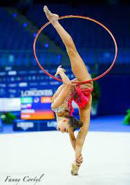 The hoop may be of a natural colour or be partially of fully covered by one or several colours, and it may be covered with adhesive tape either of the same or different colour a. Hoop International Rhythmic Gymnastics Ballet