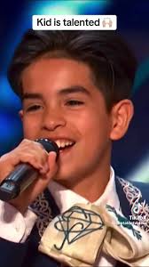 Guy Singing with Mariachi