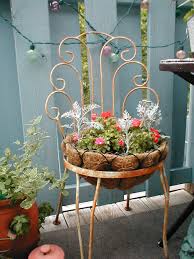 How To Repurpose Old Patio Chairs Into Cute Planters Garden Containers Chair Planter Container Gardening