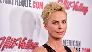 Charlize theron aeon flux hairstyle. Charlize Theron Trades In Bowl Cut For Shorter Blonder Hairstyle Photos Allure