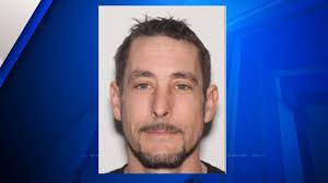 Police searching for Fishers man charged with rape, domestic battery