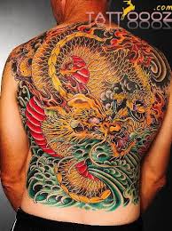 Tribal dragon tattoos for men. Colorful Traditional Dragon Tattoo On Man Full Back