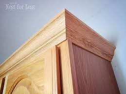 In a room with tall ceilings, you need a heavier, wider crown to look good; Mini Makeover Crown Molding On My Kitchen Cabinets Kitchen Cabinet Crown Molding Crown Molding Kitchen Crown Moulding Kitchen Cabinets