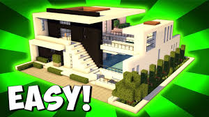 Many modern houses are designed to create clean, visually pleasing areas of contrast. Minecraft How To Build A Large Modern House Tutorial 2017 Minecraft Modern Modern Minecraft Houses Minecraft Mansion