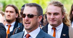 College football coaching overachievers and underachievers