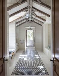 To further tie in the kitchen design to the ceiling there is a shiplap island with white granite countertop. Powder Bathrooms Collins Interiors Shiplap Bathroom Bathroom Ceiling Shiplap Ceiling