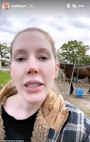 Pregnant Katherine Ryan shows off her blossoming baby bump in a black maxi  dress