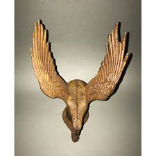 Decorative statues and figurines add a sense of personal style to interior spaces. Figurine Eagle Spread Wing Cast Iron Antique Late 19th Century George Glazer Gallery Antiques