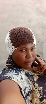 Blend style and comforting warmth with this Granny Square Cat Hat from  Annie's FashnStitch!