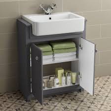These cabinets feature a clean, gentle finish that exudes cleanliness and purity. 1167mm Cambridge Midnight Grey Combined Vanity Unit Belfort Pan Vanity Units Bathroom Furniture Design Bathroom Furniture