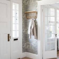 Notice how the entryway wall shelf makes the small entryway looks far more appealing. 25 Small Entryway Decorating Ideas That Make A Big First Impression