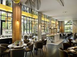 A combination of open shelving and floor cabinets and a wonderful island/bar/workspace. Latest Hotel Review Hotel Designs