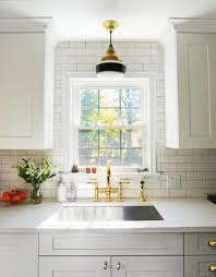 Many commercial faucets are installed right on the sink, providing a solid, but weighty, user experience. How To Light Up The Kitchen Sink With Style Inspiration Barn Light Electric