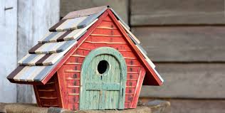 The purple martin house features 6 sides. Bird Houses Yard Envy