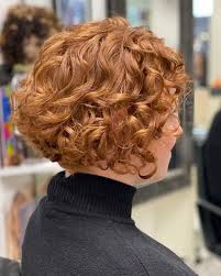 Source bingewatch_curly high ballerina bun 29 Most Flattering Short Curly Hairstyles To Perfectly Shape Your Curls