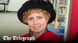 Husband charged with attempting to murder Cambridge academic at £1 million  home