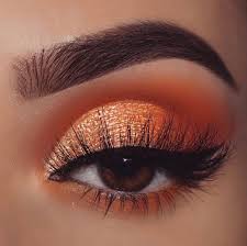 For this orange smoky eyeshadow look, i used a few colors from the lawless eyeshadow palette in the one. first, i applied an eyeshadow base to ensure that nothing would smudge or run. Orange Eye Makeup Eyeshadow Makeup Eye Makeup