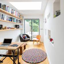 This garage conversion blends a home office and a small seating area complete with a couch for guests. 9 Inspiring Garage Conversion Ideas Love Renovate
