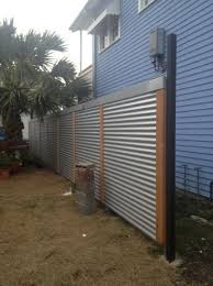 Corrugated Fence Chateau St Backyard Patio Designs Fence Design Privacy Fence Designs