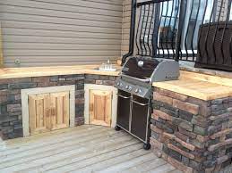 Outdoor Kitchen With Cedar Cultured Stone Www Thelittledecker Ca Outdoor Kitchen Wood Deck Designs Backyard Patio Designs