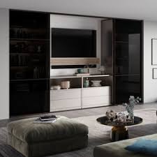 With a sturdy base and cushioned top, the ottoman also provides extra seating, which is perfect in a small space. Legno Interior Closet Storage System Architonic