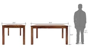 Extending horizontally between wall portions 29 and 30 are two parallel elongated ridge portions 31 and 32 raised. Dining Tables Upto 20 Off Buy Wooden Dining Table Sets Online Urban Ladder