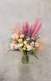 A lovely bouquet to soothe and comfort, a variety of white and peach blossoms sends your hope and strength. Colourful Fresh And Dried Flower Bouquet Flower Delivery London Your London Florist