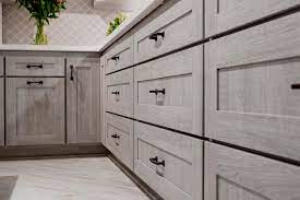 A photo documentation of the entire step by step process of a stunning kitchen transformation using the fine paints of europe coverings product line. Custom Cabinet Refacing Contractor Reborn Cabinets