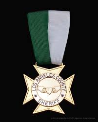 The Humanitarian Award Is Presented To Those Department Members Who Selflessly Perform Acts Of Personal Commitment La County Sheriff County Sheriffs Johnny Law