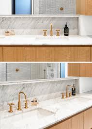We chose a rustic maple cabinet with a husk stain. Contemporist Penny Tiles And Brass Fixtures Set The Scene For This Bathroom Design Contemporary Designers Furniture Da Vinci Lifestyle