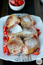 A breakfast place near my house makes a blueberry stuffed french toast that my fiance loves. Strawberry Stuffed French Toast