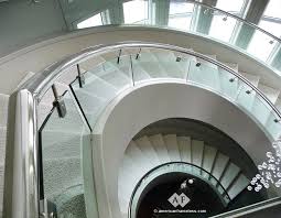 Try a curved pop art staircase design with colorful carpeted treads, a wood handrail, and concrete, glass or painted wood fence surrounding the stairs instead of. American Frameless Glass Stair Railings 1 800 606 1776