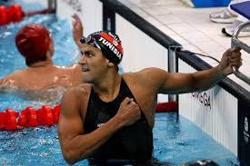 13th fina world aquatics championships rome 2009. Oussama Mellouli Celebrates Winning The Gold Medal In The Men S 1500m Freestyle Final Abc News Australian Broadcasting Corporation