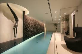 Once you have determined the size, shape, depth, you need to think of the finishing material. 20 Beautiful Indoor Swimming Pool Designs